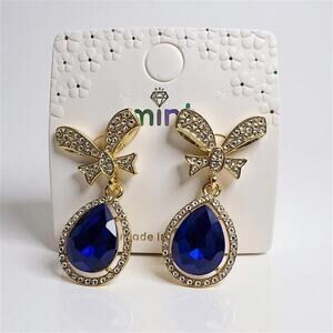 Gold Bow Drop Earrings with Sapphire Blue Teardrop Crystal